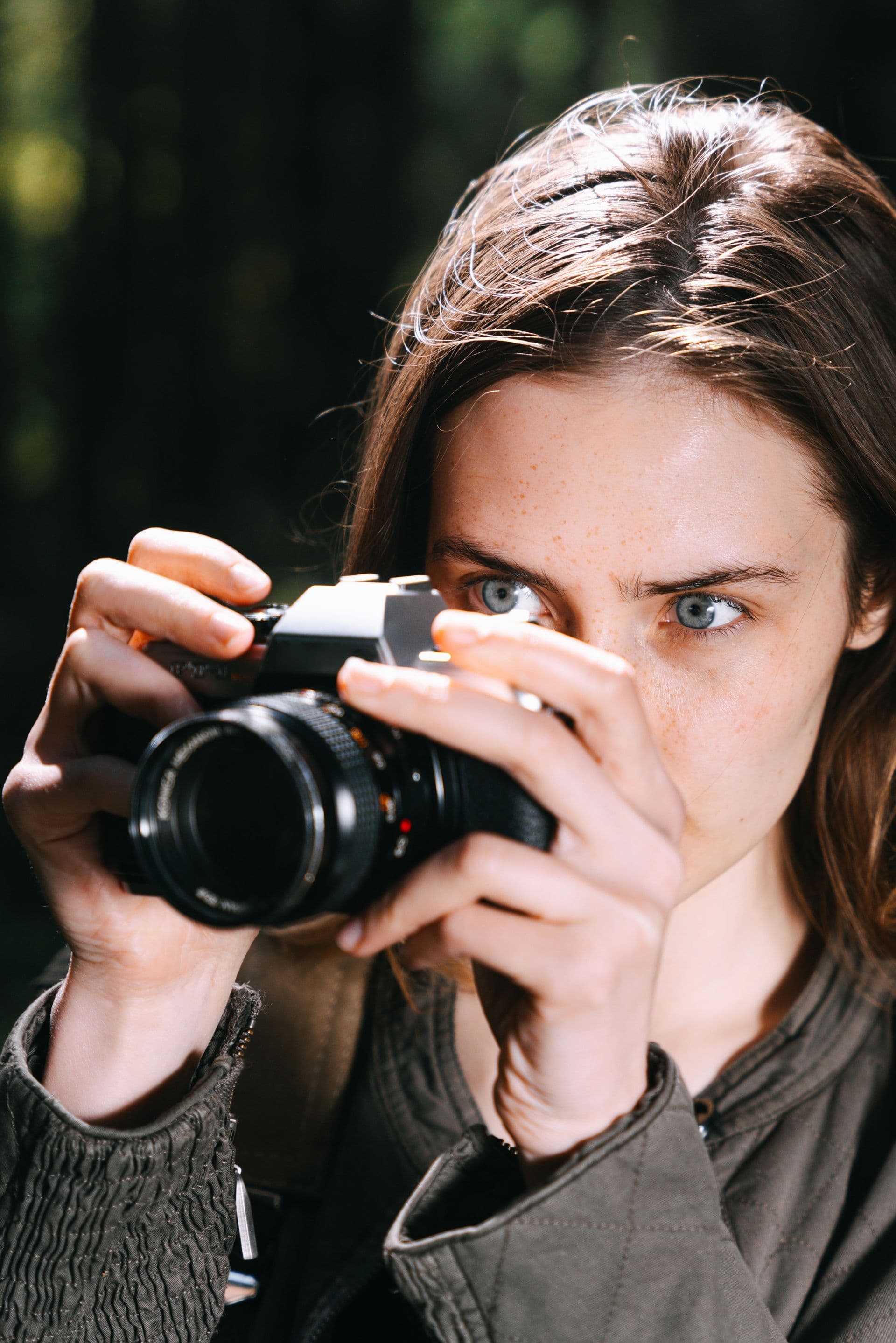 Studio founder holding a camera